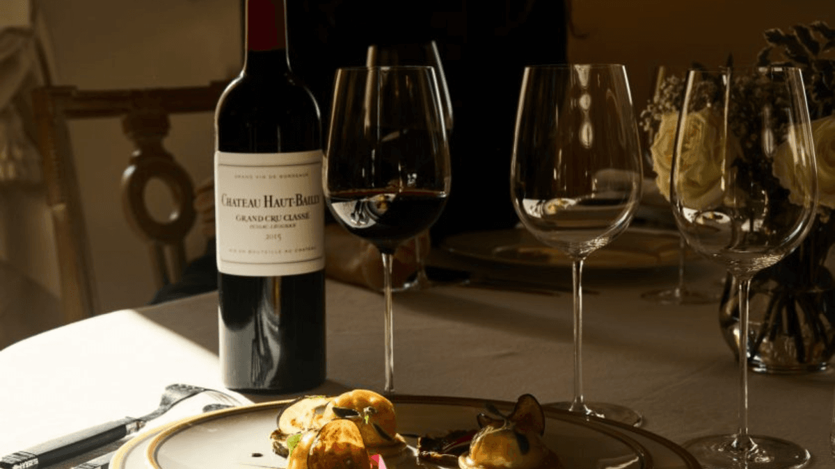 Illustration de l'événement : Dîner à 4 mains au Château Haut-Bailly, avec Vivien Durand (chef étoilé du Prince Noir)